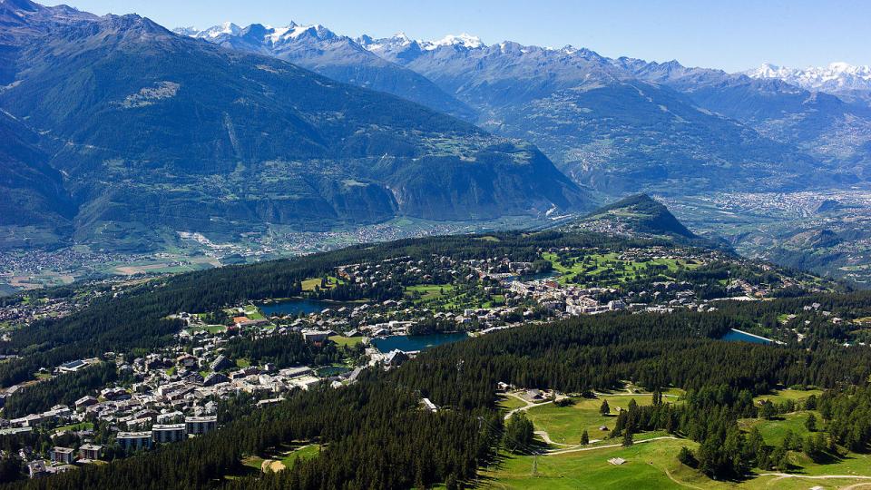 Photo Credit: Wikipedia Creative Commons License  Crans Montana été (PHOTO-GENIC.CH/ OLIVIER MAIRE)  Date: 11 August 2011, 08:27:59  Author: Crans-Montana-Communication 