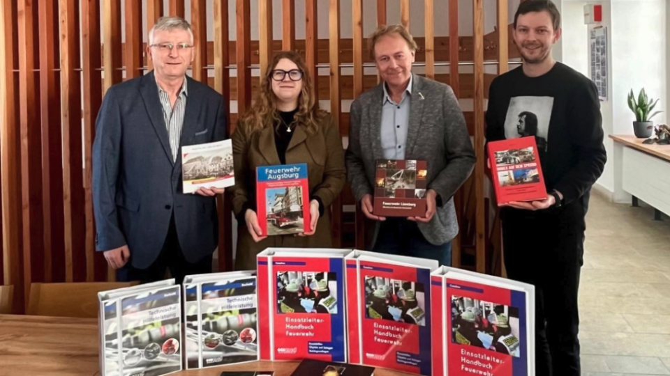 Photo by CTIF. As seen in the picture from left to right: Peter Wagner (CTIF Center of Fire Statistics), Iveta Krpalkova (Head of archive), Harald Herweg (CTIF Center of Fire Statistics), and Jan Karel (Archive and Library Pribyslav).