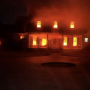 Sam Lee and Amanda Riggins Peden are known in Fountain Inn, South Carolina for their big Halloween decorations. This year, the couple's house appears to be engulfed in flames through an amazing illusion. Courtesy Sam Lee